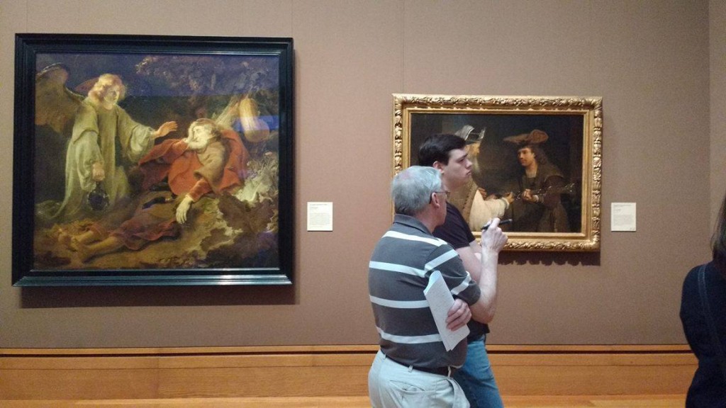 studying paintings at the art museum