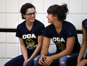 Christian boarding school, coaches of Girls' Volleyball Team, at Top Christian Academy, enjoy a quiet moment