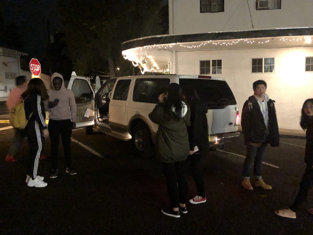 Students get up super early in the morning to be driven to the airport